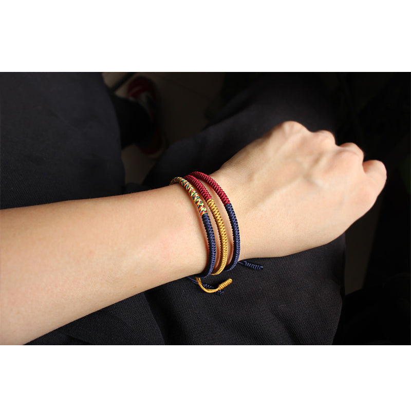 Handmade Tibetan Lucky Knots Bracelet - blue, red, golden mix - Gitelle